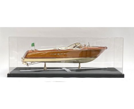 A scale model of a Riva motor launch, 64cm long; within a perspex case, the case 79cm long 
