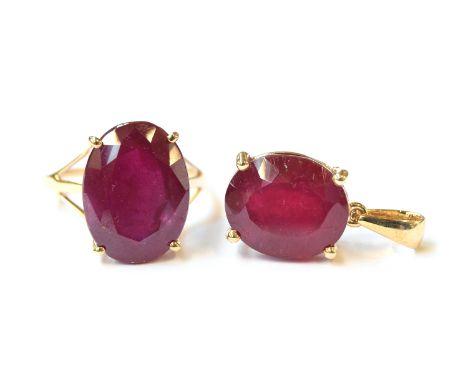 A 10ct gold ring set with a large ruby, the Malagasy ruby 13.6cts, size Q, 4.6g; together with a matching 10ct gold and Malag