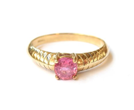 A 9ct gold Padparadscha sapphire solitaire ring, the sapphire 0.98cts and measuring 6x5.5mm, size Q, 2.6g 
