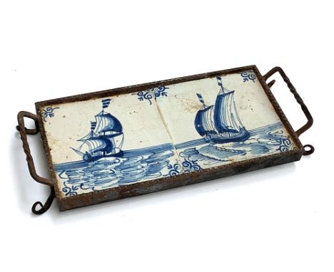 A wrought metal and Delft tile stand, 30cmW 
