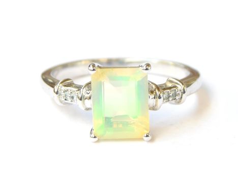A sterling silver ring set with an opal and alexandrite, the octagonal cut Ethiopian opal 1.3cts and 9x7mm, the Orissa alexan