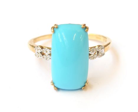 A 9ct gold ring set with a cushion cabochon Sleeping Beauty turquoise, the shoulders set with natural white zircons, the turq