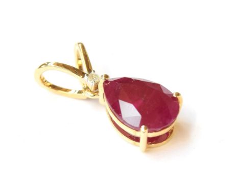 A 9ct gold ruby and diamond pendant, the pear shaped Burmese ruby 3.2cts and 11x8mm, 1.4g 