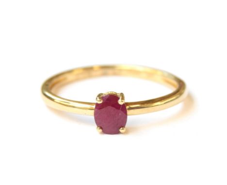 A simple 9ct gold ruby solitaire ring, the Burmese ruby 0.4cts, size N, 1.2g 