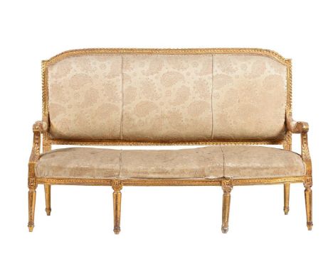 A giltwood and upholstered sofa in Louis XVI style, second half 19th century, 160cm wide, 55cm deep, 103cm highProvenance: Fr