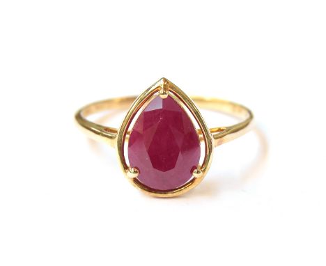 A 9ct gold ring set with a ruby, the pear cut Burmese ruby 3.1cts, size T 1/2, 2.5g 