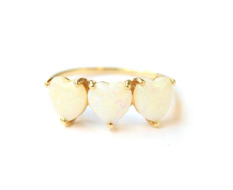 A 10ct gold ring set with three heart shaped Coober Pedy Australian opals, size Q, 2.2g 