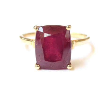 A 10ct gold ring set with a large cushion cut Madagascan ruby, 9.2cts, size R 1/2, 4.4g 