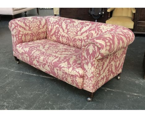 A Chesterfield sofa upholstered in a red and gold acanthus print, 165cmW 