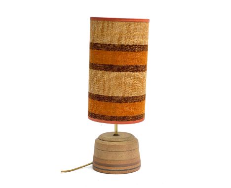 A mid century studio pottery table lamp with hessian shade, 55cmH 