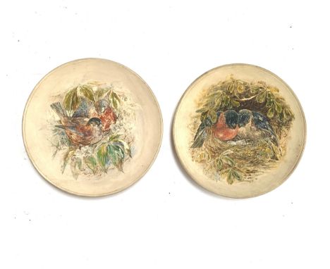 Two Torquay Watcombe pottery plates, handpainted with birds, 16cmD