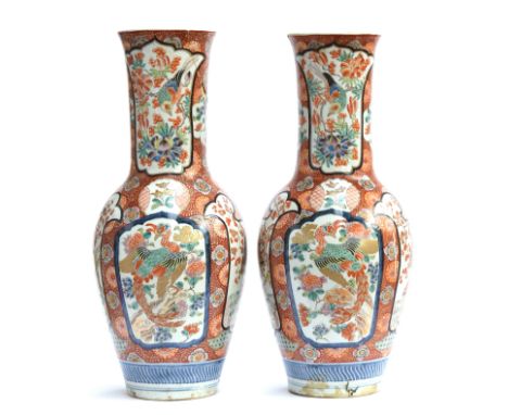 A pair of large decorative Japanese vases, depicting samurai and phoenix in polychrome enamel decoration, 62cm high, both af 