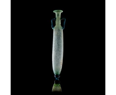 LARGE ROMAN GLASS FLASK EUROPE OR NEAR EAST, 3RD - 4TH CENTURY A.D. mould blown body, the long body with subtle diagonal ribb