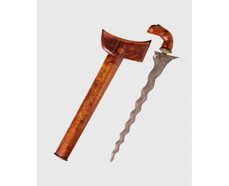 KRISS KNIFE INDONESIA forged iron and carved wood, with highly abstracted anthropomorphic wooden handle, distinctive wave bla