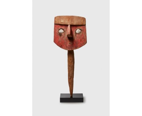 CHANCAY FACE MASK CENTRAL COAST, PERU, C. 1100 - 1300 A.D. carved wood, shell and hair, the broad face with bright red pigmen