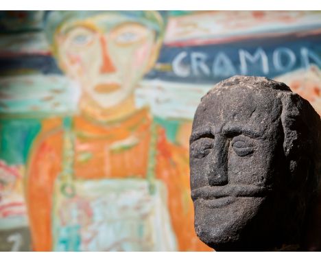 ANCIENT CELTIC STONE HEAD UNITED KINGDOM, LIKELY 1ST CENTURY B.C. carved and weathered red sandstone, of powerful visage, wit