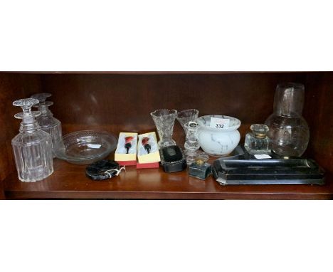 Shelf of glass vases, decanters, bottle stoppers etc