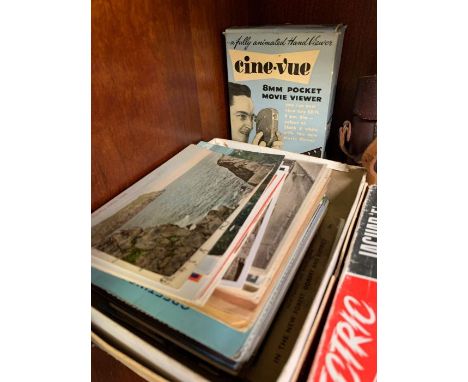 Shelf of collectables to include camera's, early glass bottles, cuckoo clock, 1960's scalecraft boxed cars, old postcards etc