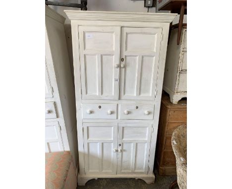 Modern white painted pine cupboard, 2 drawers to the top, opening to a single fixed shelf, 2 drawers below and a 2 door cupbo