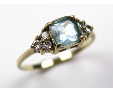 9ct Ring set with Aquamarine and CZ size O weight 2.0 grams