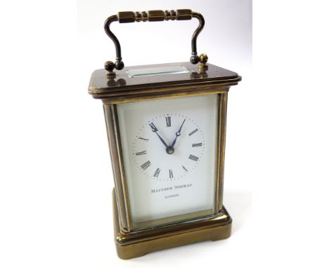 Brass cased carriage clock by Matthew Norman, London, Height 11.5cm approx.