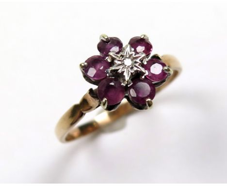 9ct Gold Ring floral set with Rubies and Diamond size R weight 2.5 grams