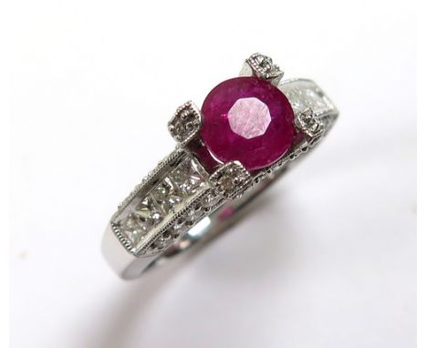 18ct White Gold Ring with central Ruby 1.0 ct weight with Diamond shoulders 1.00 ct weight size O weight 5.8 grams