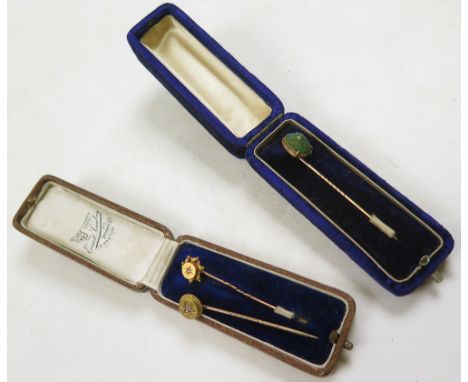 Three 15ct Gold and Yellow metal stick pins 2 in original cases