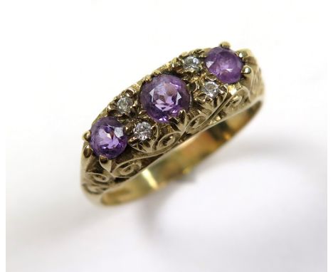 9ct Gold 3 stone Amethyst Ring size P weight 3.4 grams