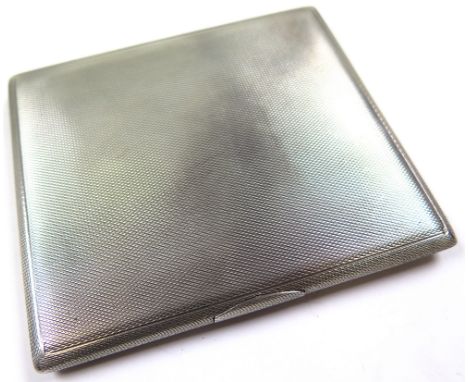 George V hallmarked silver cigarette case of rectangular form with engine turned decoration , Birmingham 1935, Approx weight 