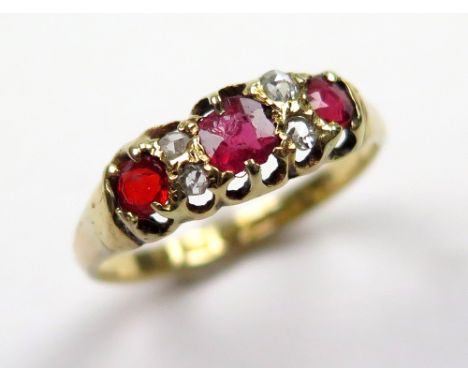 18 ct Gold Ruby and Diamond Ring size O weight 2.6 grams