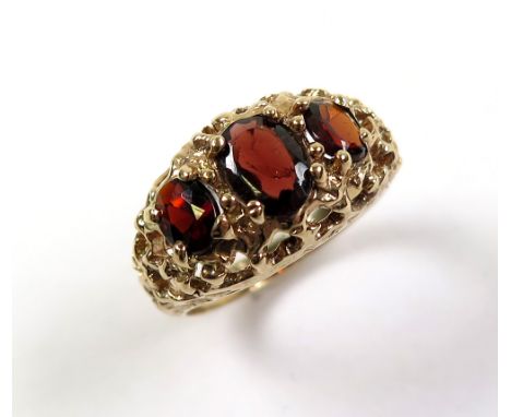 9ct Gold 3 stone Garnet Ring size K weight 3.9 grams