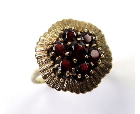 9ct Ring with Floral set Garnets size S weight 4.9 grams