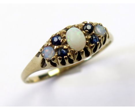 9ct Ring set with Opal and Sapphires size N weight 1.5 grams