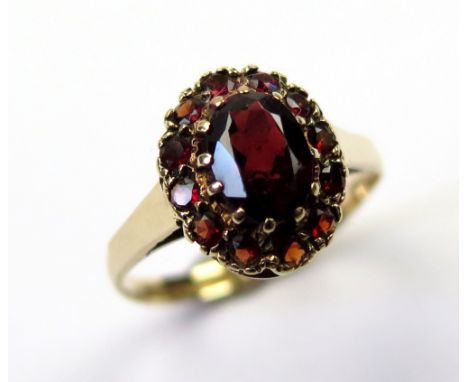 9ct Gold Ring set with Garnets size K weight 1.8 grams 