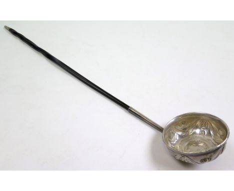 Georgian ? toddy ladle (tests as silver), set with a Quenn Anne Shilling dated 1708 with a twisted whale bone handle, approx 