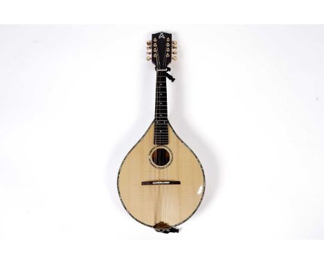An Ashbury Deluxe stye S Celtic electro-acoustic mandolin, with three-piece laminated neck, figured hardwood body, and spruce