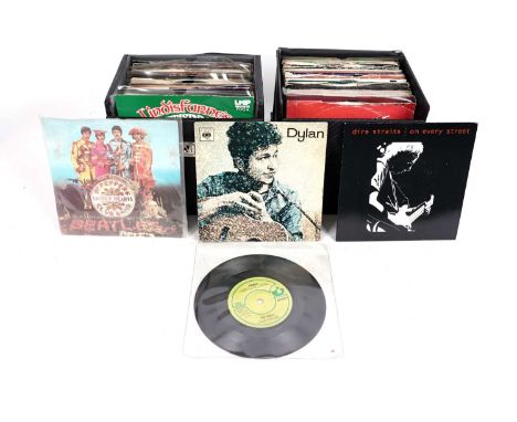 A collectors' bundle of mixed 7" singles, artists to include: Rolling Stones; The Beatles; Deep Purple; Bob Dylan; Dire Strai
