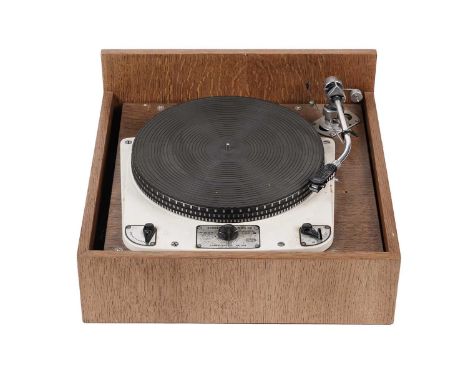 A vintage Garrard 301 record-deck with 'Stroboscopic' turntable, fitted an SME tone-arm and a Shure V15 III cartridge, on oak