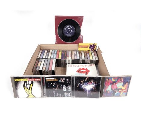 A collectors' bundle of Rolling Stones 7" singles, CDs, and cassettes, to include: a mounted 7" single of 19th Nervous Breakd