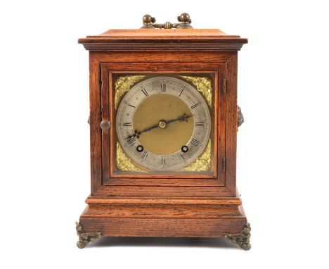 Victorian oak bracket clock, rectangular case with moulded outlines, cast handle, lion masks to the sides, scrolled bracket f
