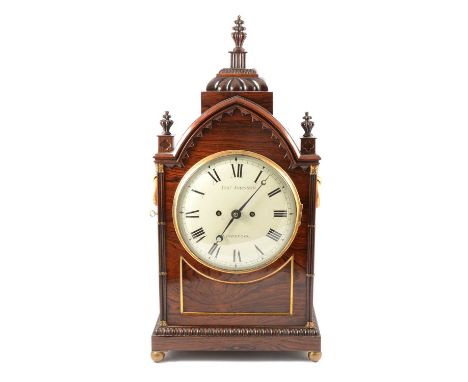 George IV rosewood bracket clock, lancet-shape with fluted finials, quarter engaged columns, side ring handles and grilles, o