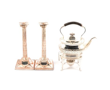 A pair of silver-plated candlesticks, Inoic form with material swags to square base, removable sconces, 30cm; and a silver-pl