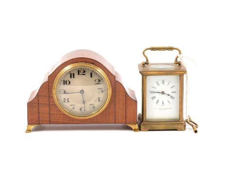 Walnut cased mantel clock, doned top, Buren cylinder movement, 13cm, and a brass carriage clock timepiece.Qty: 2Condition rep