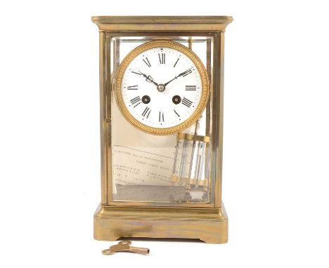 Brass framed "four glass" mantel clock, circular enamelled dial, the movement striking on a gong, mercury compensated pendulu