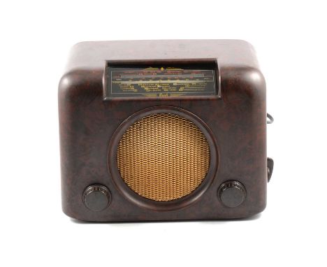 Bush bakelite radio, 30cm, and a Masteradio walnut cased mains radio, 45cm.Qty: 2