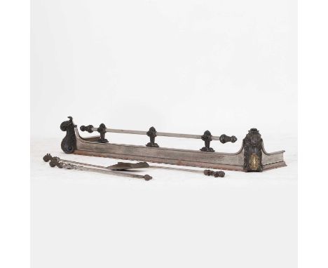 A Victorian polished steel and cast iron fire kerb, with rail and cast iron acanthus-leaf-moulded ends,138cm wide,together wi