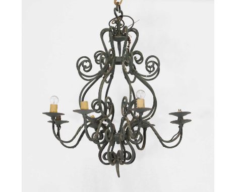 A wrought-iron eight-light chandelier,  20th century, with brass drip pans, 75cm diameter 150cm high    Condition ReportElect