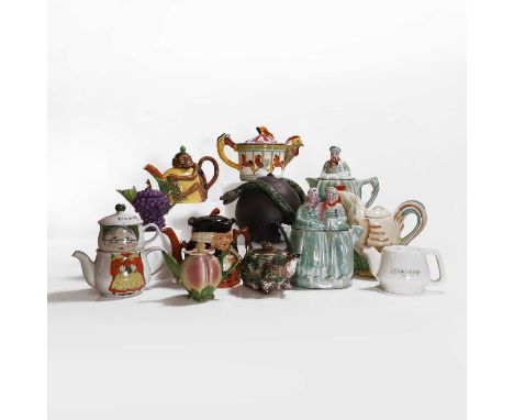 Twelve teapots and covers, including a Whieldon-style shell-shaped pot with a swing handle, a modern Minton majolica-style mo