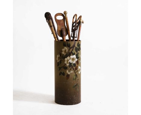 A toleware painted umbrella stand, late 19th/early 20th century, decorated with flowers on a green ground,60cm high,together 
